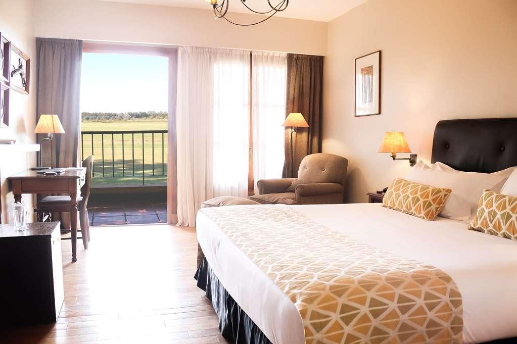 Wyndham Garden Lujan Hotel Room photo