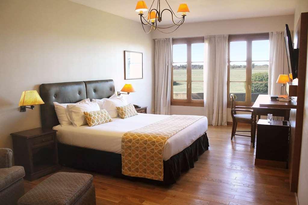 Wyndham Garden Lujan Hotel Room photo