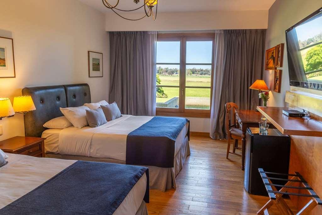 Wyndham Garden Lujan Hotel Room photo